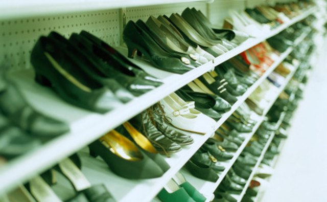 Shoes in thrift stores can also be organized on display racks by color and size.