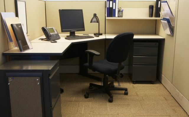 The workstation should provide ample room for the multiple tasks and include a swivel chair.