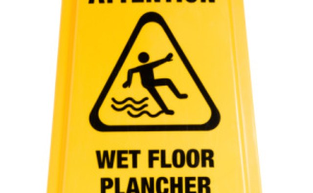 Wet floor signs are one way to prevent slips and falls.