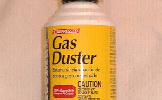 USE A BRUSH OR KEYBOARD DUSTER