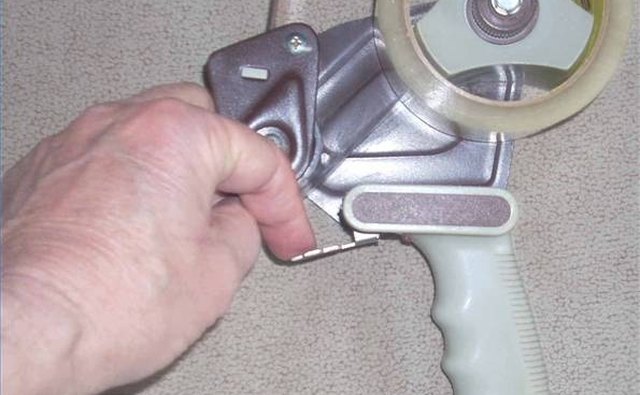 How To Put Tape On A Tape Gun