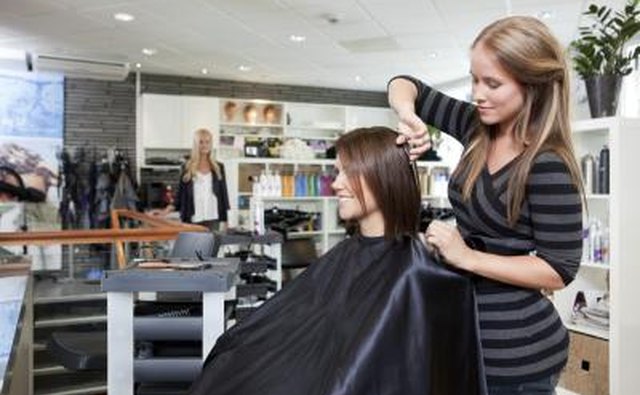 Hair dresser in salon