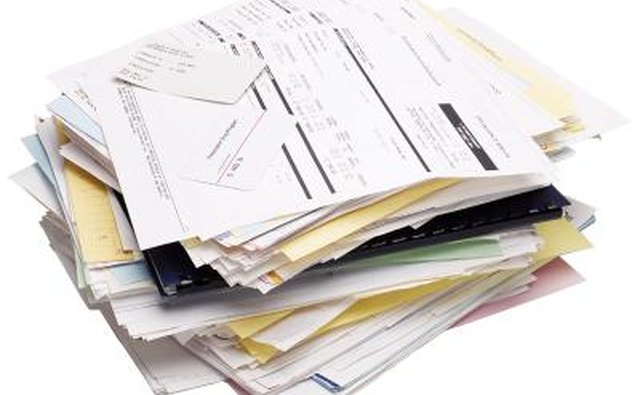 Stack of medical bills and receipts.