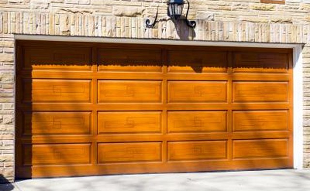 Wood, aluminum and steel are three materials often used in the construction of garage doors.