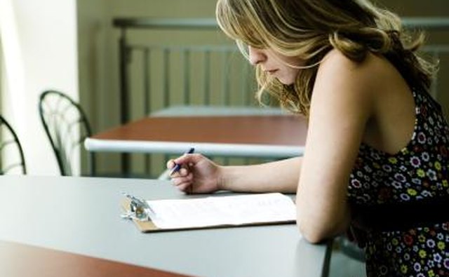 Woman taking cosmetology exam