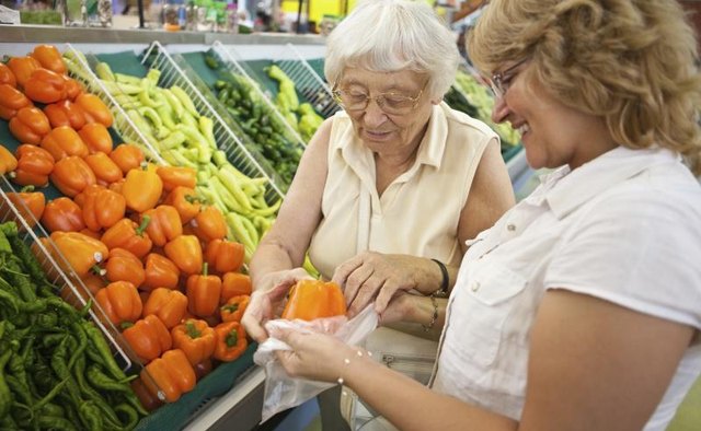 Women gathering produce