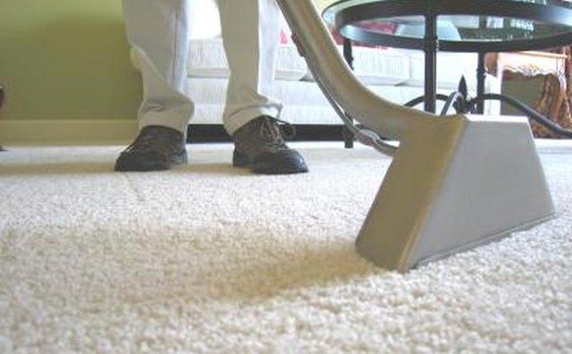 Carpet being cleaned with industrial vaccum