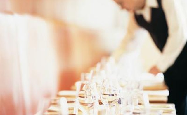 Waiter setting table