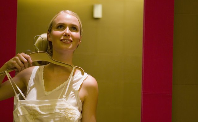 Smiling woman in dressing room