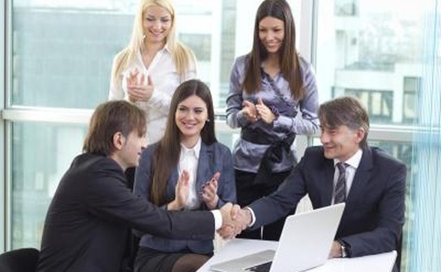 Employee being congratulated for a job well done