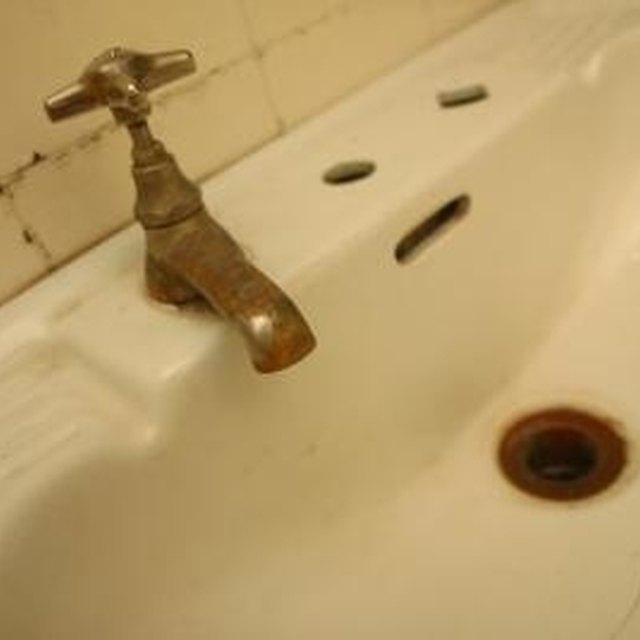 How to Remove a Corroded Bathroom Sink Drain Pipe From the Wall