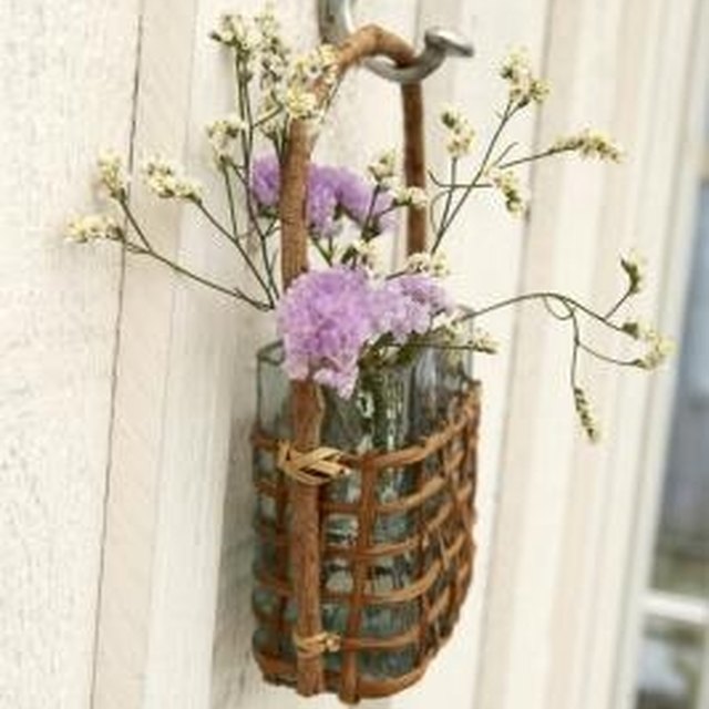 How to Put Plant Hangers on Siding HomeSteady