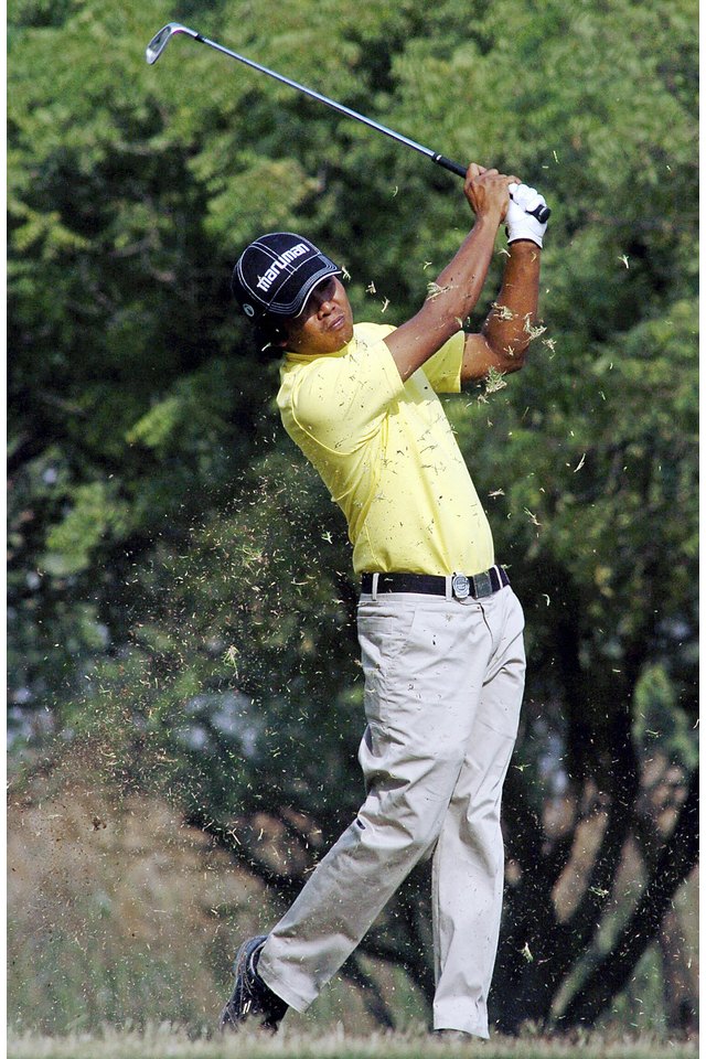 Malaysian golfer Lain Steel tees off dur