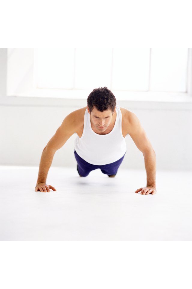 a young man doing pushups