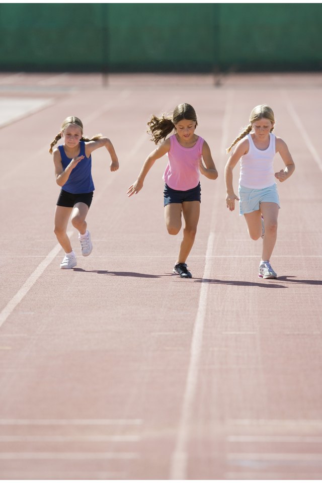 Girls running on track