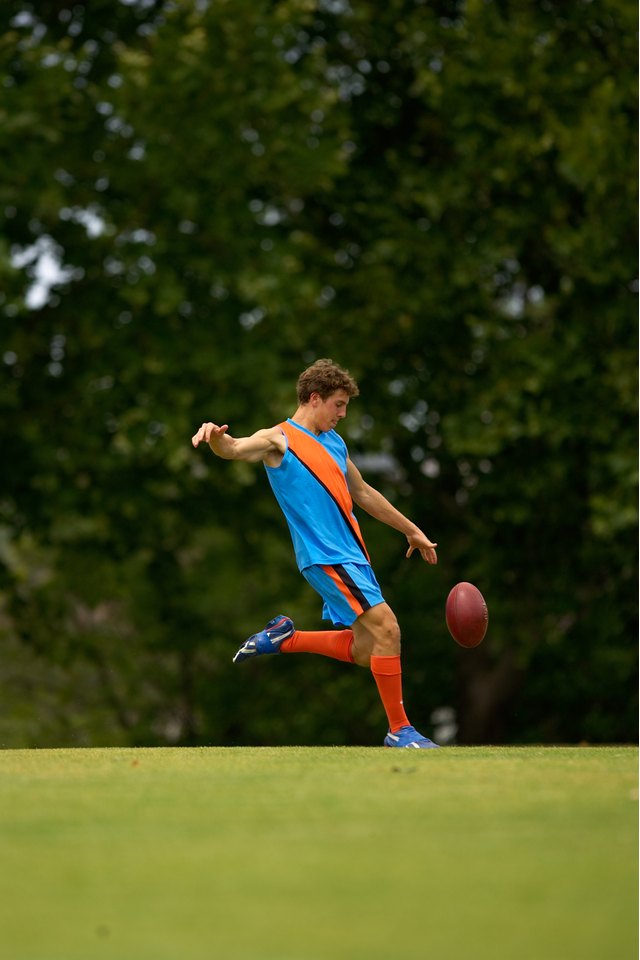 Player about to kick an Australian football