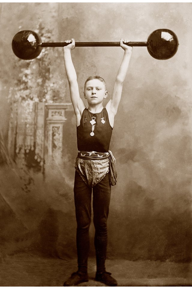 Boy lifting weights