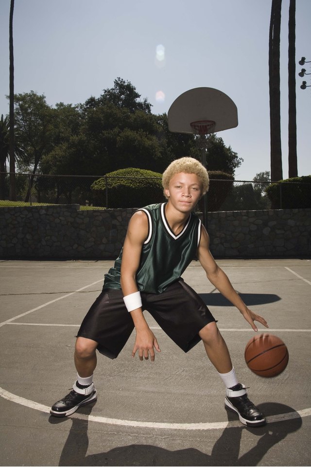 Teenage boy on basketball court