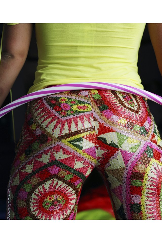 Woman playing with plastic hoop
