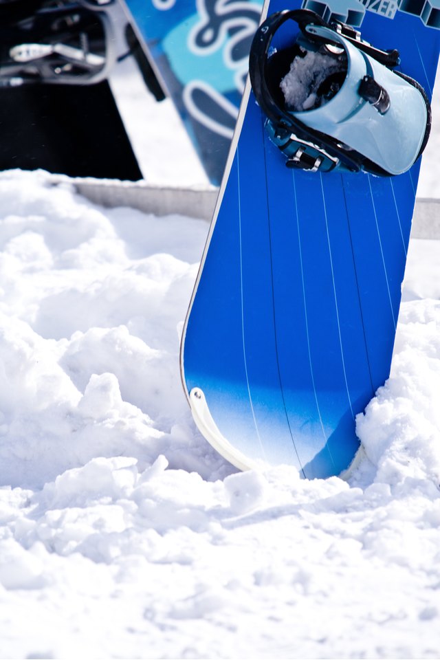 Snowboard in snow