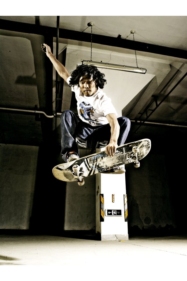 Man performing jump on skateboard