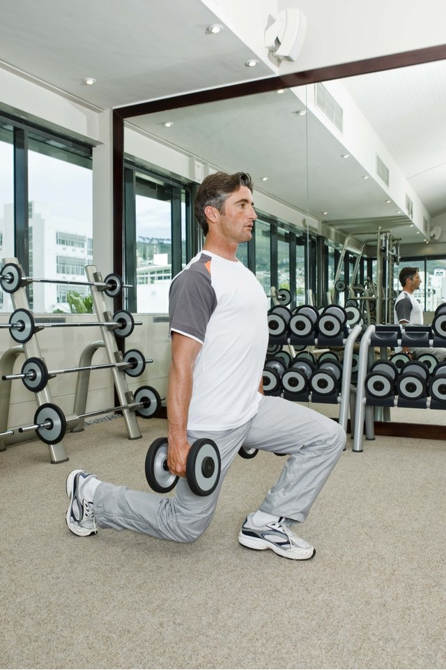 Man lifting weights in gym