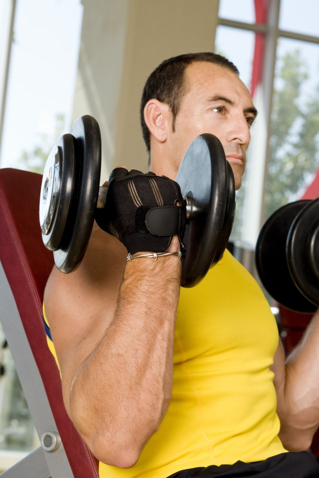 Man using dumbbells