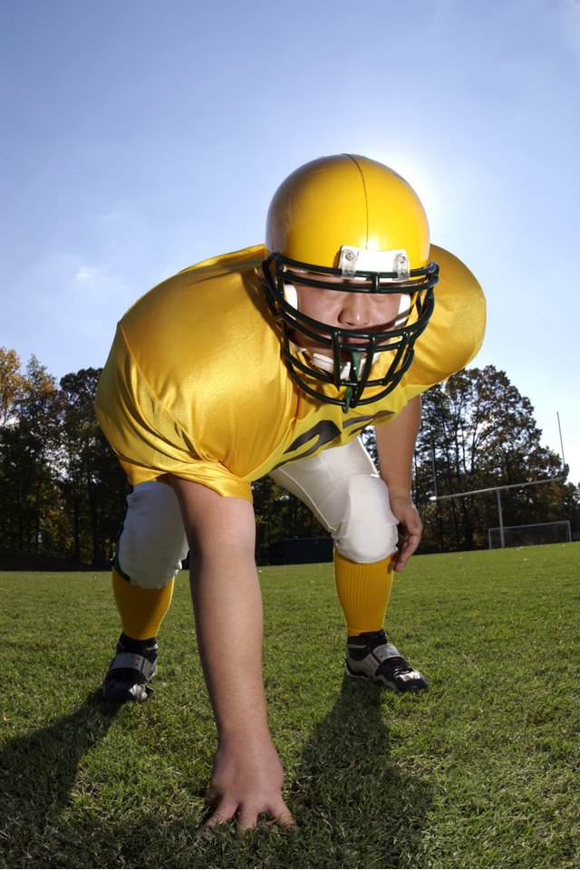 Football player crouching