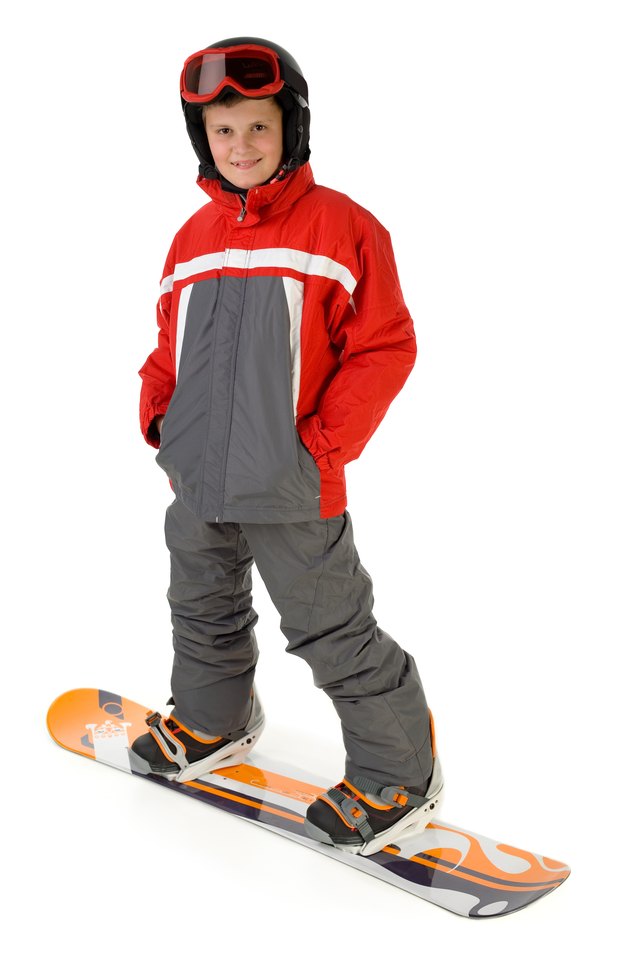 Boy posing as a snowboarder