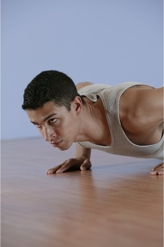 Man doing pushups on floor