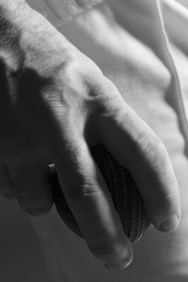 Person holding baseball