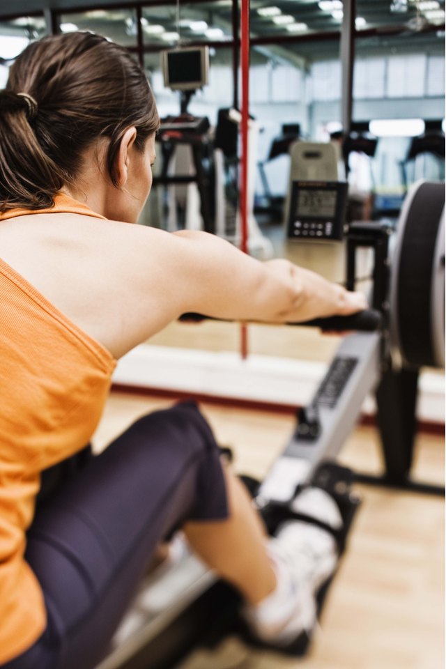 Woman on rowing machine