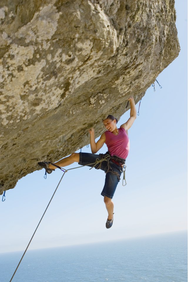 Woman rock climbing