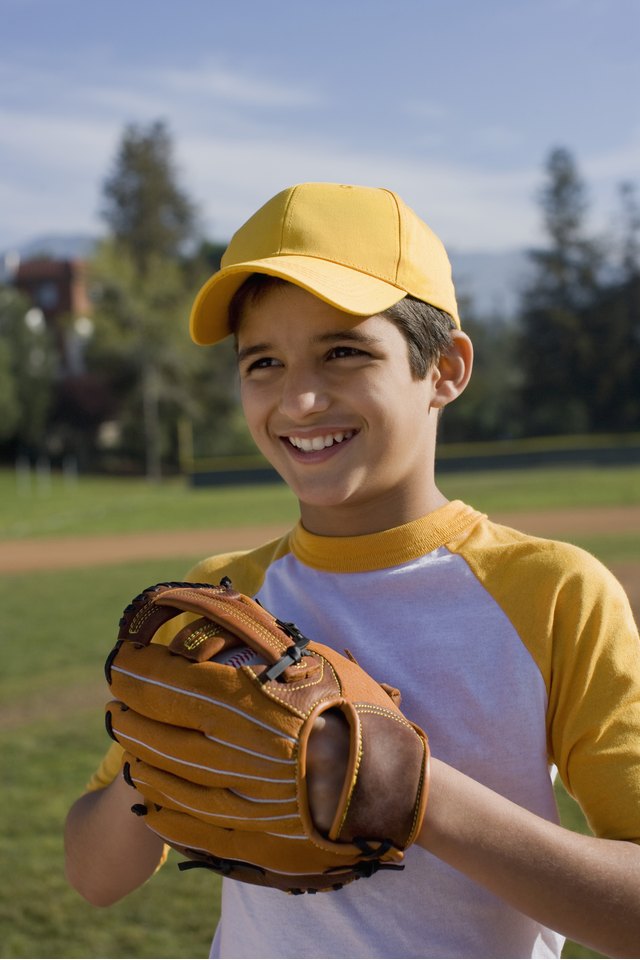 Portrait of boy with baseball mitt