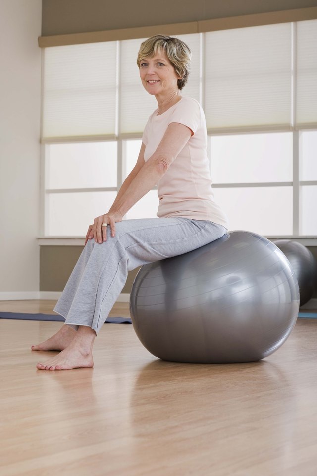 Woman using exercise ball