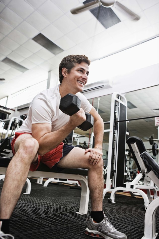 Man lifting dumbbells