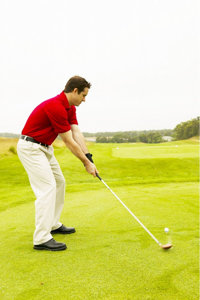 A low drive in golf can be caused by several factors, including stance, swing plane and placing the tee too low.