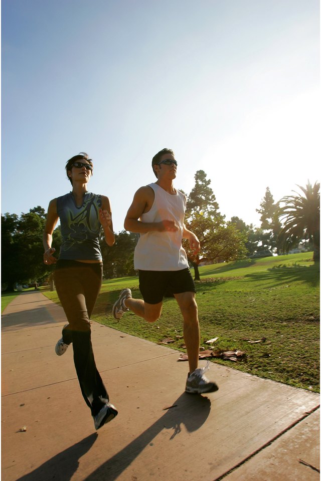 Couple jogging in park