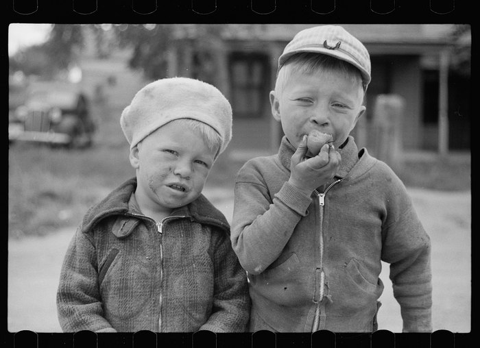 In Sisseton, in 1939, these two boys were photographed towards the end of the Great Depression.