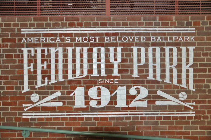 The Fascinating History (& Secrets) of Fenway Park's Iconic Green Monster  - FanBuzz