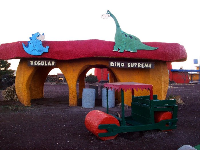 Dinosaur slide in the winter twilight of Bedrock City, AZ …