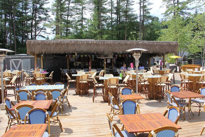 Sink Your Toes In The Sand At Sunset Tiki Bar In Massachusetts