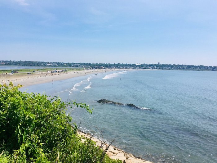 The Water Is A Brilliant Blue At Easton's Beach In Rhode Island