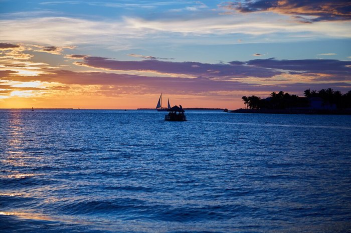 Rent A Floating Tiki Bar From Cruisin Tikis Key West In Florida