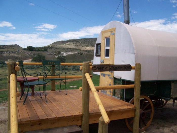 Historic covered wagon in wyoming at K3 guest ranch