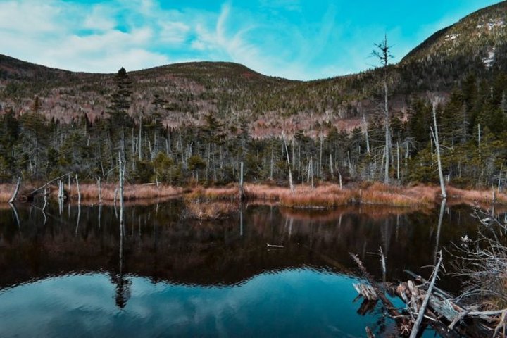 The One Hikeable Lake In New Hampshire That's Simply Breathtaking In The Fall