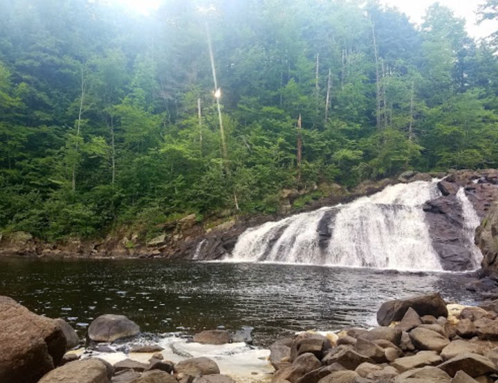 You’ll Want To Spend All Day At This Waterfall-Fed Pool In New Hampshire