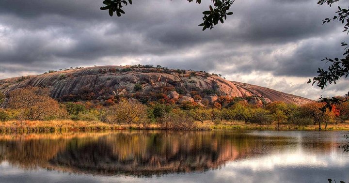 Texas' Enchanted Rock State Natural Area Has It All With Caves, Hiking, Rock Climbing, and Camping