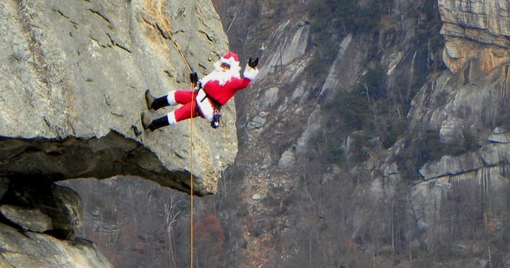Watch As Santa Climbs Chimney Rock In North Carolina To Practice For All Those Deliveries On Christmas Eve