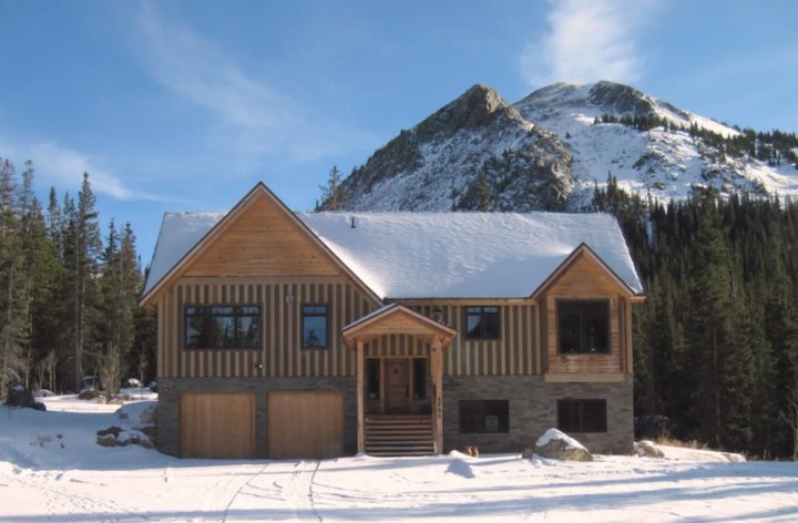 This Keystone Chalet Is A Colorado Airbnb With A Mountain And Waterfall In The Backyard